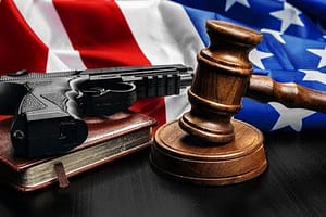 Gavel on wooden table with USA flag. High quality photo
